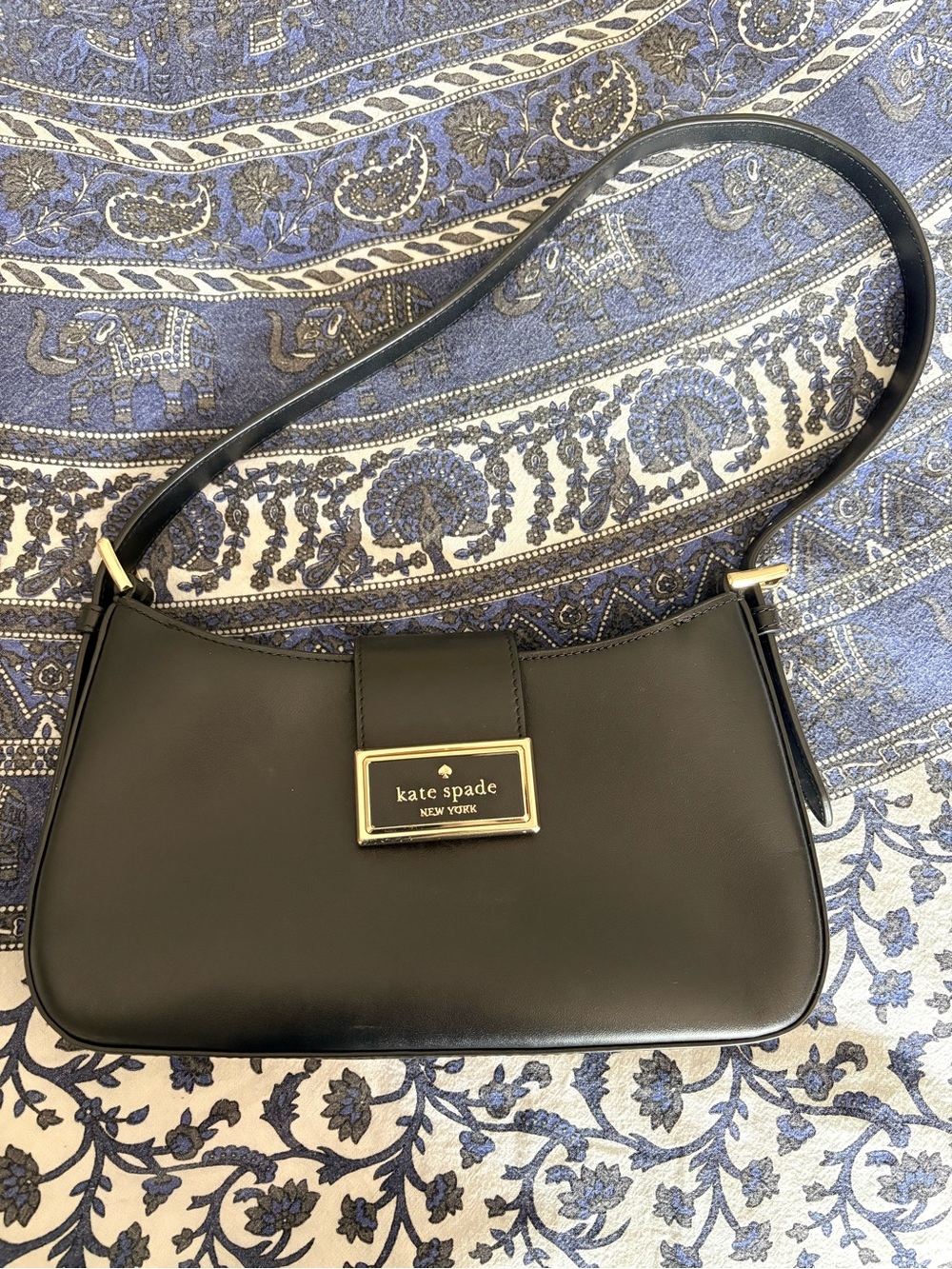 kate spade black leather shoulder bag with gold plaque